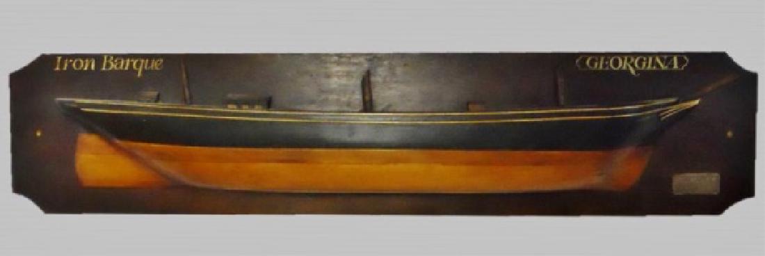 Vintage Wood Half Hull, Iron Barque Georgina: 20th C. decorative hand made half hull, ship identified as, "IRON BARQUE GEORGINA". Half hull crafted in stacked wood with deck details and hand painted. Board with brass plaque reads, "John Hunt & Co
