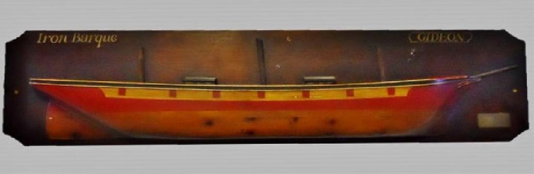 Vintage Wood Half Hull, Iron Barque, Gideon: 20th C. decorative hand made half hull, ship identified as, "IRON BARQUE GIDEON". Half hull crafted in stacked wood with deck details and hand painted. Board with brass plaque reads, "Parkin & Carr Lt