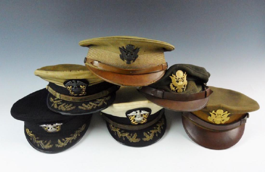 Collection, WW1-WW2 US Military Visor Hats, (6pc): Collection of six World War One and Two US Army and Navy visor caps: (1) World War One US Army enlisted visor cap, (1) World War Two US Army felt officer's visor hat, (1) World War Two US Army Air Cor