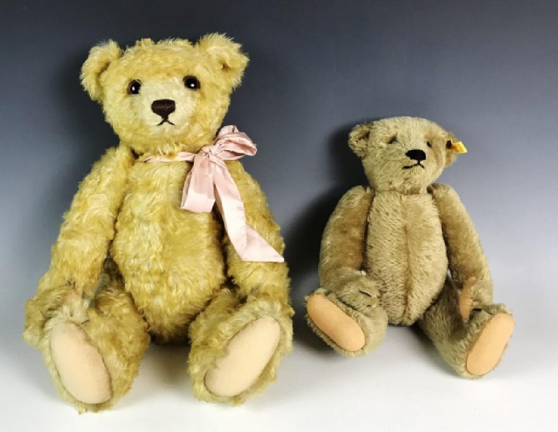Two Vintage Mohair Teddy Bears, Steiff, (2pc): Two vintage jointed teddy bears, Steiff: (1) Large jointed mohair teddy bear with pink ribbon, brass button affixed to ear reads, "Steiff", measures:13" H , (1) jointed mohair teddy bear with button a