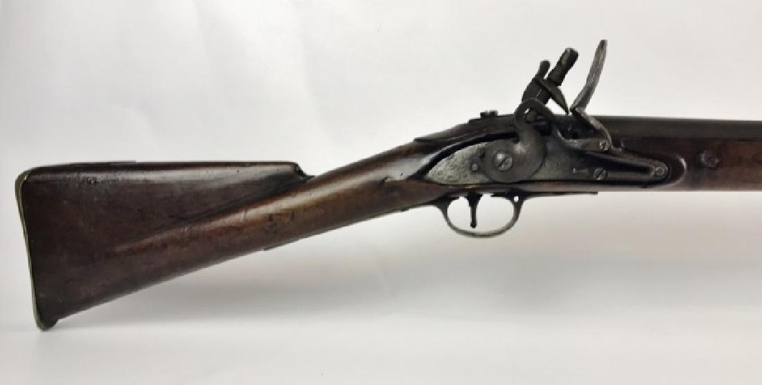 British 3rd Model Brown Bess Flintlock Musket,1802: Napoleonic War period British third model "Brown Bess" flintlock musket. Musket with refitted lock dated "1802" with East India cypher in heart. Action in working condition with strong main spring. Mu