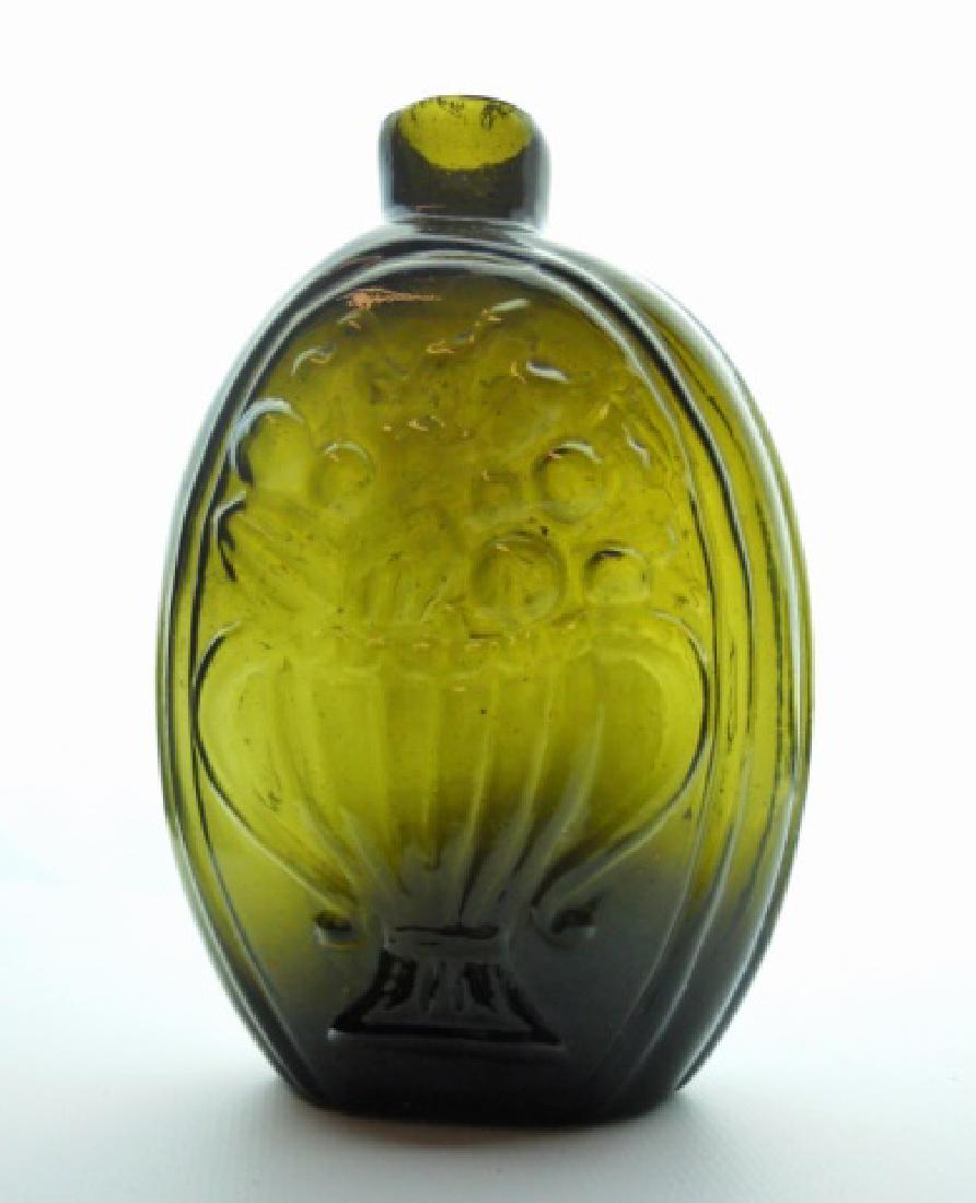 19th C. Historical Flask, Urn Cornucopia, Keene NH: Circa 1820 blown half pint flask with pontil mark and sheared lip. Flask olive in color, embossed with cornucopia and urn design. Likely manufactured at Keene New Hampshire. Exceptional near mint cond