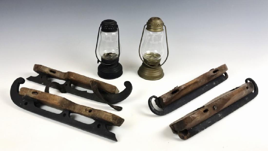 Collection, 19th C. Ice Skating Items, (6pc): Collection of 19th C. Ice Skating antiques: (2) Ice skating lamps, fluid lamps with glass shade and swinging bail handle, (2) Pairs of primitive ice skates, wood sole with bench made iron blades and r