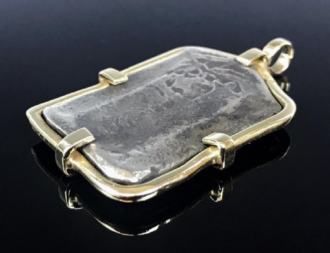 14K Gold Spanish Silver 4 Reales Cob Coin Pendant: 17th C. Spanish Four Reales silver cob treasure coin in a jeweler made 14K yellow gold bezel. Total weight: 16.5 g.