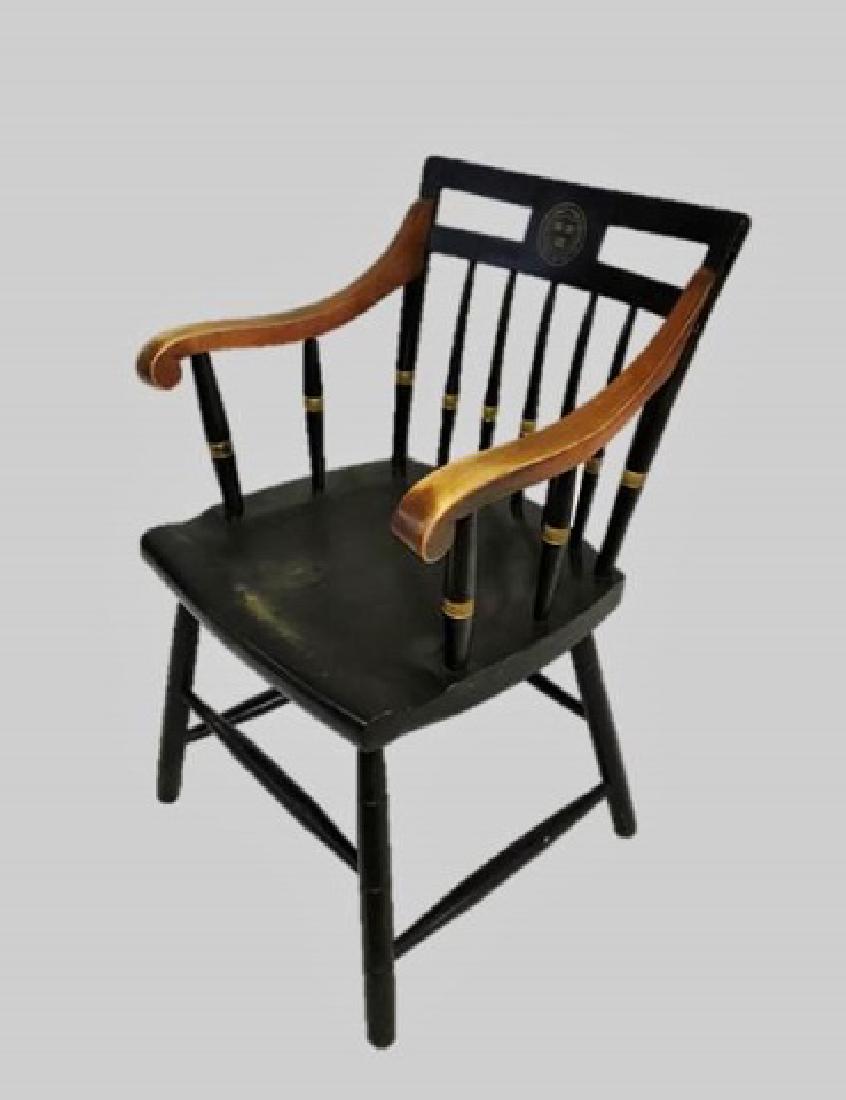 Antique Harvard Windsor Chair: Early 20th C. Windsor armchair with Harvard "VE RI TAS" Decoration. Board seat with turned spindle back in black and gold paint. Chair measures: 34" H x 23" W x 19" D.