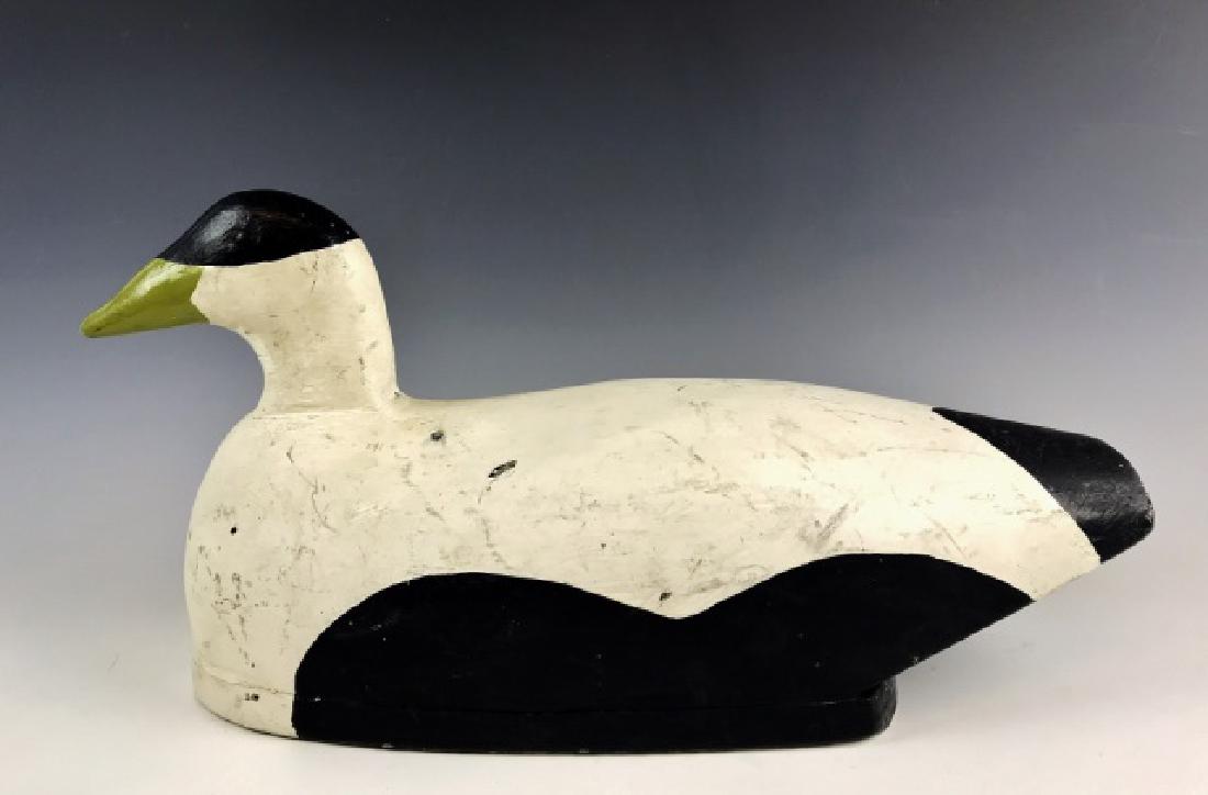 Antique Hand Carved Goose Decoy, Joe Lincoln: Antique hand carved wood hollow body self bailer Goose decoy, attributed to Joe Lincoln, Accord Massachusetts. Decoy with tack eyes, bottom bears "H. V. LONG" brand. Body with period gunning touch-ups