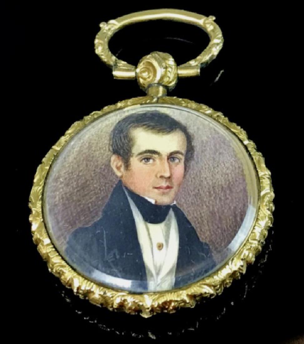 19thC 14K Gold Locket with Hand Painted Portraits: Antique locket with 14K gold and glass frame with two detailed hand painted portraits of a gentleman and lady. Locket measures: 1" D, total weight:10.5g