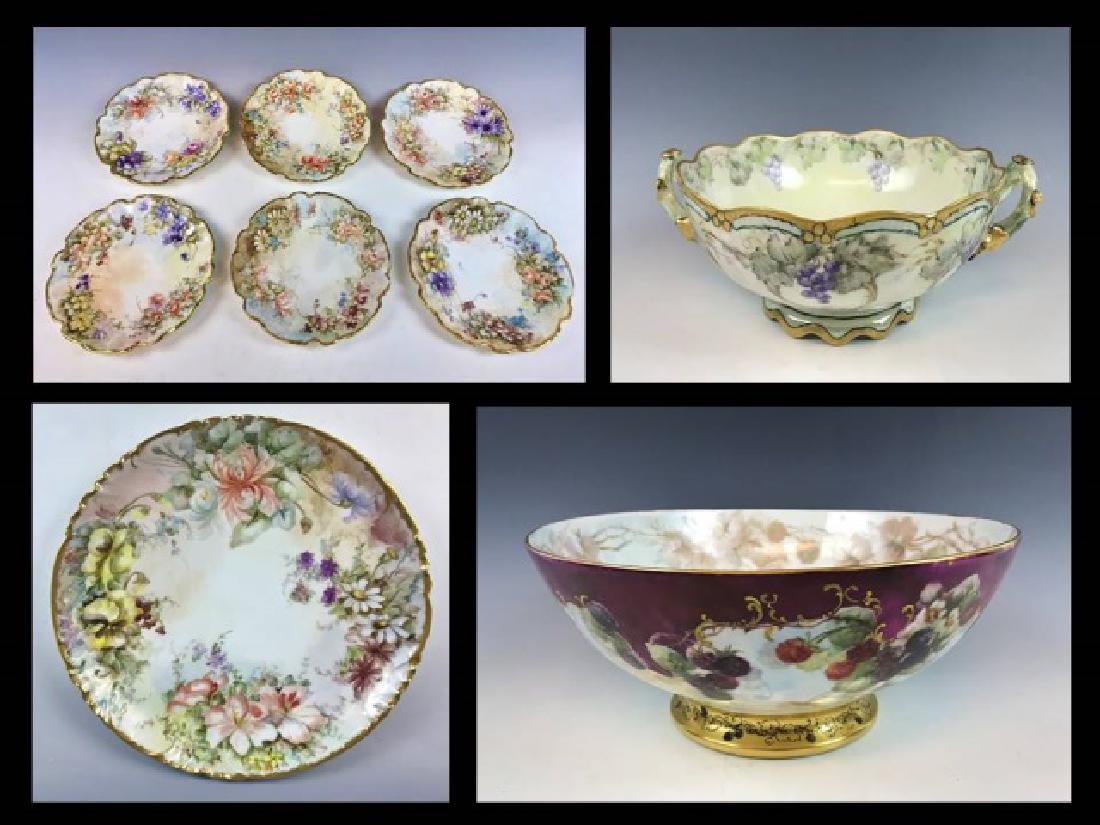 Antique Hand Painted Limoges Porcelain, (9pc): Collection of high quality Antique hand painted Limoges porcelain: (1) Large footed centerpiece bowl, hand decorated with fruit, floral designs, gilded base, measures: 6" H x 15.5" D (1) Centerpiece b