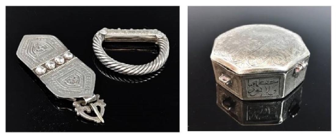 Three Antique Bedouin Silver Items, (3pc): Collection of three antique Bedouin silver items: (1) Solid silver bracelet with twist repousse decoration, (1) Solid silver belt buckle with repousse decoration, (1) Hand chased silver lidded box wit