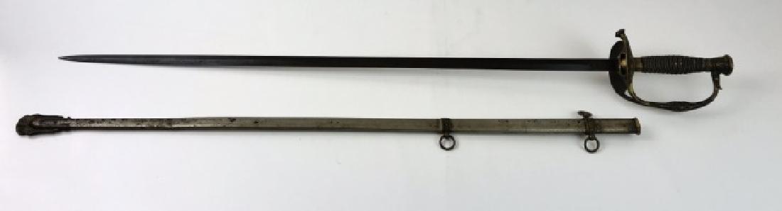 US Model 1860 Officer's Sword, Ridabock & Co: 19th C. US Model 1860 Staff & Field officer sword, signed "Ridabock & Co New York". Straight etched steel blade, brass hilt with clamshell guards, one folding, with patriotic decoration, shagreen grip