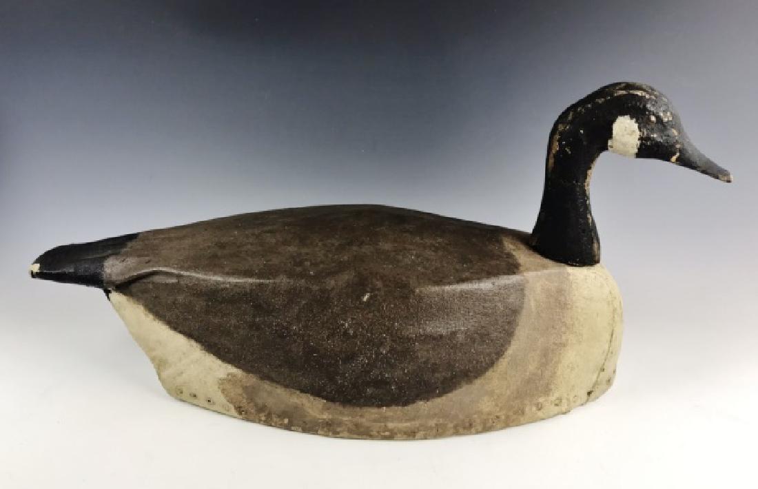 Wood, Canvas Goose Decoy, Silver Lake, Kingston: Antique carved wood and canvas body goose decoy. Decoy came from a collection of Silver Lake shooting stand decoys. Attractive painted surfaces with tack eyes, light wear consistent with age and field
