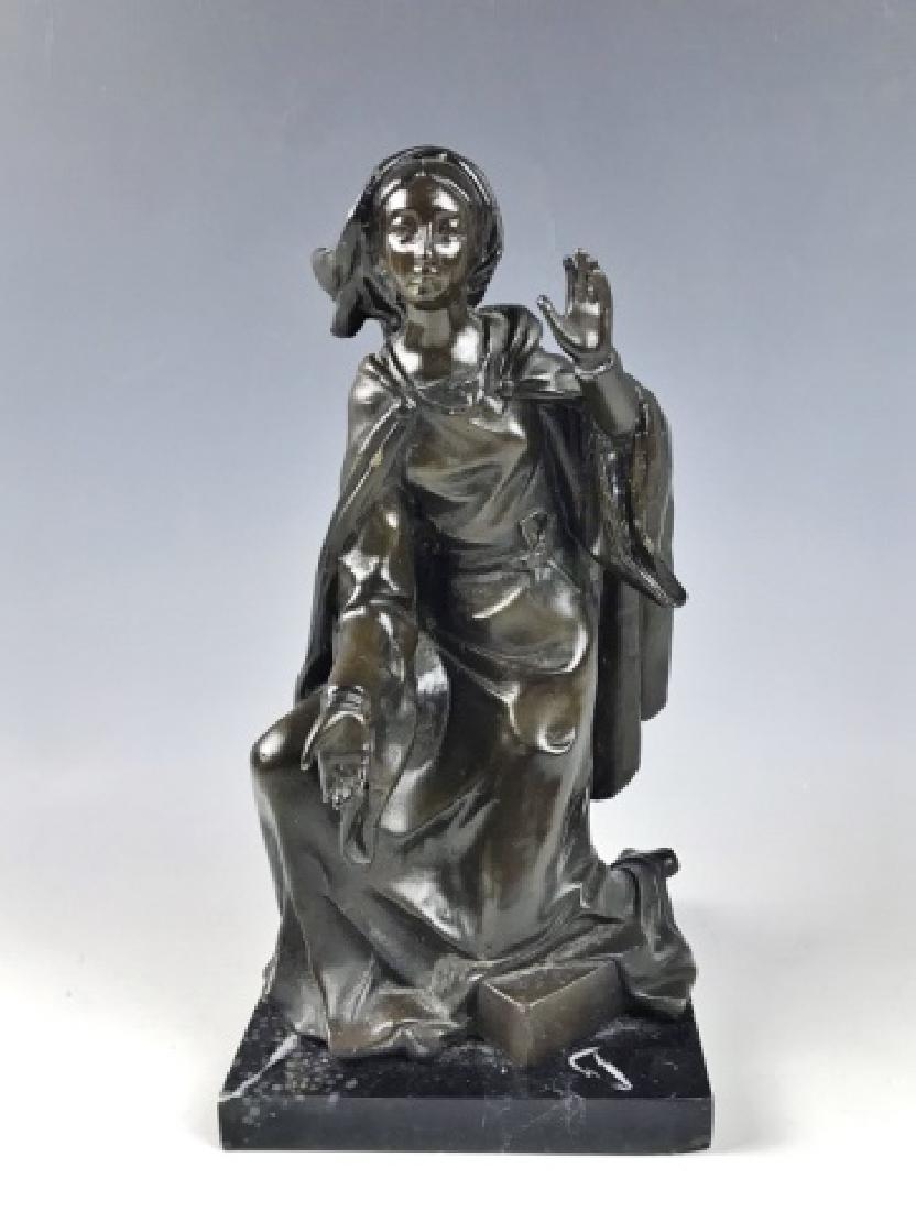 Cast Bronze Statue of Woman: Figure in cast bronze with stone base. Female form in cloak with hand raised in benediction. Measures: 11.5" H x 6" W