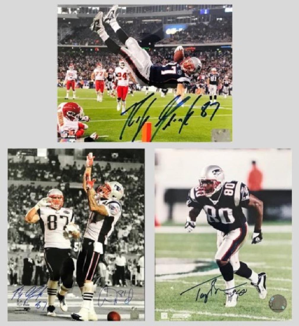N.E. Patriots Autographed Photos, Gronkowski (3pc): Collection of three authentic New England Patriots autographed photographs: (1) Large format photograph signed by both Rob Gronkowski and Aaron Hernandez, measures: 20" x 16" (1) Photograph signed by 