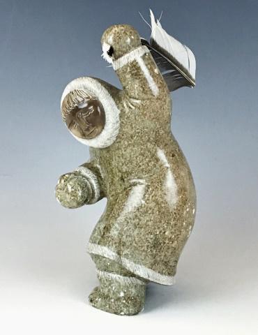 Artist Signed Native Inuit Carved Stone Figure: Hand carved stone Native Inuit figure. Figure artist signed illegible at base, measures: 8.5" H.