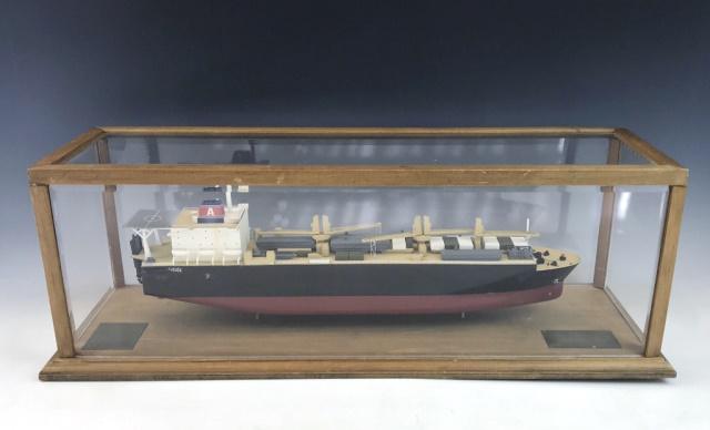 Vintage Cased Ship Model, General Dynamics: Vintage ship model with brass plate reads, "GENERAL DYNAMICS Quincy Shipbuilding Division MARITIME REPOSITIONING SHIP". Detailed accurate hand painted model with ships "Principal Characteristics" in b