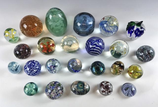 Collection, Blown Glass Paperweights, (24pc): Collection of twenty-four blown glass paperweights in a diversity of form, size and color. Several are signed and include makers: "Gibson" and "GS". Largest measures:5.5" H