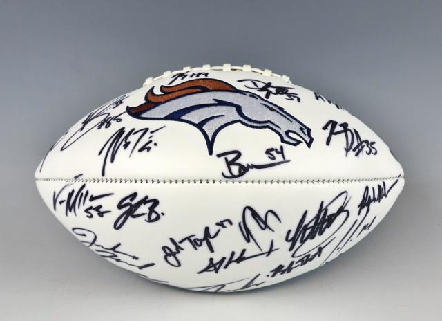 2016 Denver Broncos Super Bowl Team Autograph Ball: Denver Broncos 2016 season Super Bowl Champion team autographed football. White panel football with Broncos embroidered logo with autograph in black ink, including: Trevor Siemian, C.J. Anderson, Dema