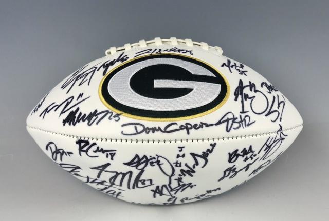 2016 Green Bay Packers Team Autographed Football: Green Bay Packers 2016 season team autographed football. White panel football with Packers embroidered logo with autographs in black ink, including: Aaron Rodgers, Clay Mathews, Eddie Lacy. Jordy Nels