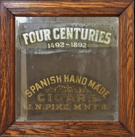 Antique Cigar Advertising Mirror, J. N. PIKE: Circa 1900 Advertising Mirror. Beveled glass mirror with gilt advertising text at top, "FOUR CENTURIES 1492-1892" bottom, "SPANISH HAND MADE CIGARS J.N. PIKE, M'N'F'R.". Glass set in period oak frame.