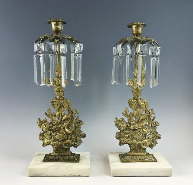 Antique French Bronze Candelabra, (2pc): Pair of 19th C. French candelabra. Gilt cast bronze neoclassical form with cut crystal lustres and marble base. Measure: 15.25" H.