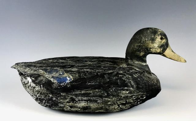 Antique Drake Mallard Decoy, Chincoteague Island: Antique primitive Drake Mallard duck decoy, Chincoteague Island, VA. Rough hewn body set with carved head. Base with carved monogram. Measures: 7" H x 15.5" L