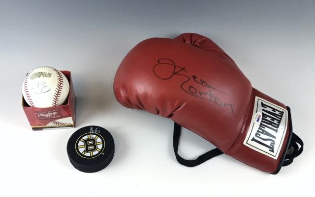 Collection, Autographed Sports Items, (3pc): Collection of three autographed sports items: (1) Baseball autographed by Red Sox pitcher, "Kurt Schilling", accompanied by cardboard box, (1) Boston Bruins hockey puck autographed, "B61", (1) Boxing 