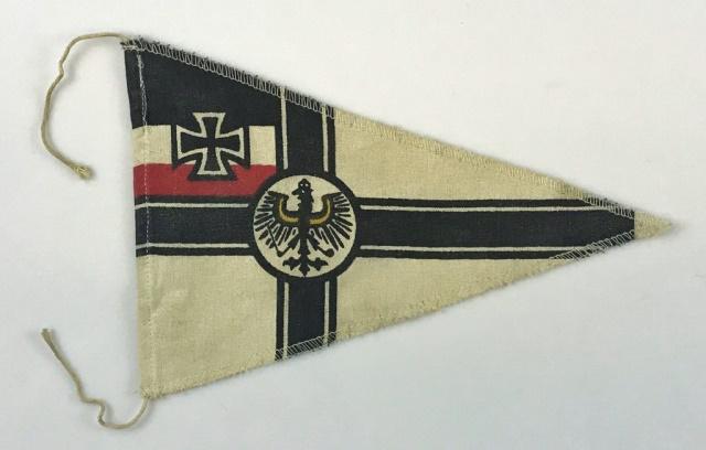 WW1 German Imperial Navy Pennant: World War One German Imperial Navy Pennant. Screen printed cotton linen construction with machine sewn edges and cord ties. Excellent condition with age tone. Measures: 10.5" L.