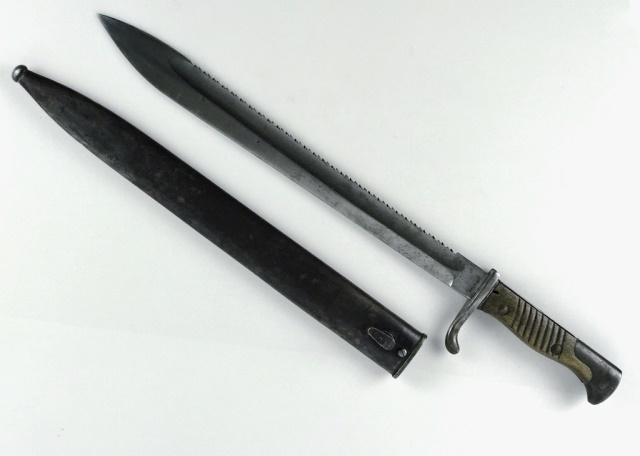 WW1 German Imperial M 1898 / 1905 Sawback Bayonet: World War One German Imperial Model 1898 / 1905 Sawback Bayonet, ricasso signed, "GEBR. HARTKOPF SOLINGEN". Bayonet with single fullered steel blade with sawback , spine marked with crowned "W 17". St