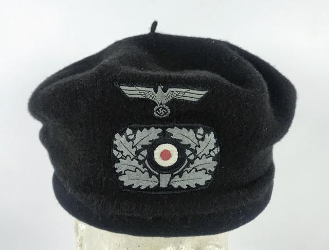 WW2 German Heer Panzer Helmet with Beret, EREL: World War Two German Heer M1934 Panzer Padded Crash Helmet and Beret. Padded helmet with felt exterior with six ventilation grommets, segmented cloth interior with maker label, "EREL Sonderklasse" wit