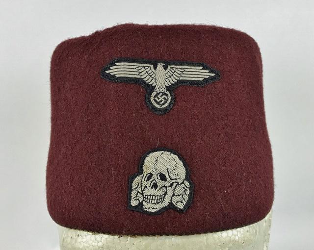 WW2 German SS Handschar Dress Fez: World War Two German SS Handschar Service Fez. Burgundy felt construction. Insignia includes two-piece BeVo woven SS eagle and death's head. Interior with brown leather sweatband. Good condition with 