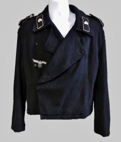 WW2 Heer Panzer EM Assault Jacket, Breeches (2pc): World War Two German Heer EM panzer assault jacket and breeches. (1) Jacket constructed of black wool with five button double breasted front closure, interior with two pockets, adjustment drawstring.