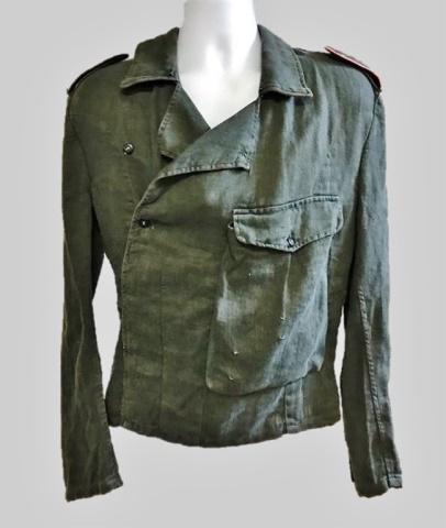 WW2 German Heer Panzer Assault Jacket: World War Two German Heer Panzer Assault Jacket. Constructed of lightweight grey herringbone twill with twelve button double breasted front closure with hooked lay down collar, single front flap pocke