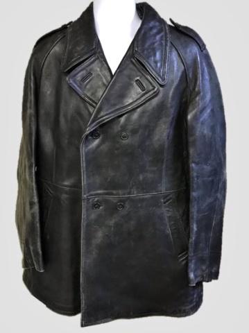 WW2 German Kriegsmarine Officer Leather Jacket: World War Two German Kriegsmarine U-Boat style officer leather jacket. Three quarter length, black leather construction, double breasted six button front closure with lay down collar, two vertical fro