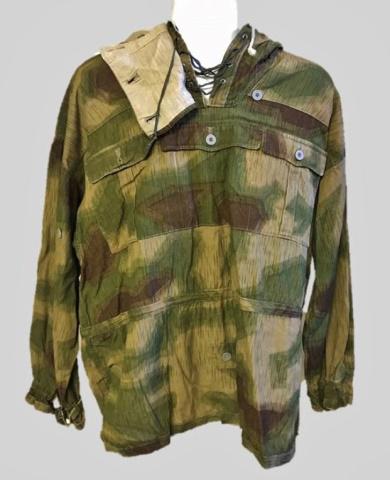 WW2 German Heer Gebirgsjager Camouflage Anorak: World War Two German Heer Gebirgsjager Reversible Camouflage Anorak. Printed camouflage cotton canvas construction in marsh 43 pattern with fully reversible off white, three flap pocket front with two