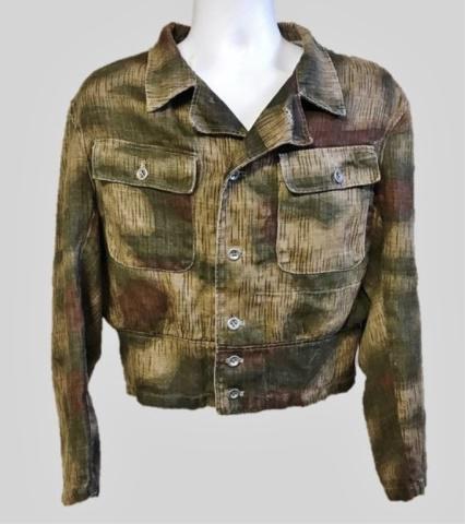 WW2 German Heer Camouflage Field Blouse: World War Two German Heer M1944 Marsh Pattern Camouflage Field Blouse. Constructed of printed herringbone twill with two button flap front pockets, six button front closure with lay down collar. Excel