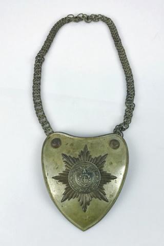 WW2 German SA / SS Standard Bearer Gorget: World War Two German First Model SA / SS Standard Bearer Gorget. Brass plate with NDSAP eagle on starburst with two bosses. Reverse with three attachment clips and center "RZM" tag and black felt back