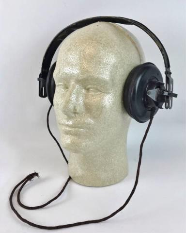 WW2 German Heer Panzer Headset, Dfh.b: World War Two German Heer Panzer Dfh.b Headset. Painted steel construction with leather and rubber covers, earphone bracket marked "Dfh.b". Cloth covered cord. Good condition with wear, missing plug.