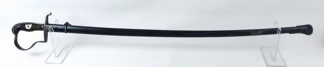 WW2 German Heer NCO Sword, Anton Wingen Jr.: World War Two German Heer NCO sword. Single fullered curved steel blade, ricasso signed "ANTON WINGEN JR SOLINGEN". Nickeled steel dove head "P" guard with langets and wire wrapped black celluloid gri