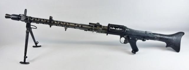 WW2 German MG34 Machine Gun, Inert Dummy Receiver: World War Two German MG 1934 Machine Gun, "dot 1945" (BRNO) Original WW2 German parts assembled on a cast dummy receiver. Gun with blued steel components with bakelite grips and butt stock with bipod.