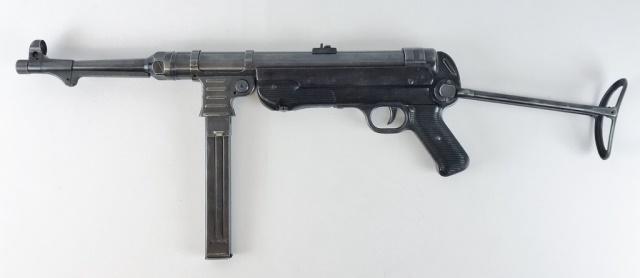 WW2 German MP40 Machine Gun, Dummy Receiver bnz 42: World War Two German MP40 Machine Gun with Dummy Receiver. Original German parts assembled on a cast dummy receiver. Gun with blued steel parts with bakelite grips, components with mixed serial number
