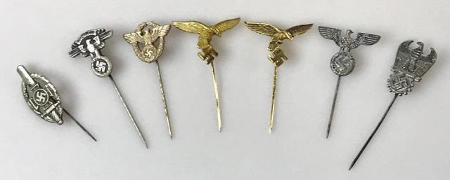 WW2 German Military, Political Stickpins, (7pc): World War Two German Military and NDSAP Stickpins: (1) N.S.K.K eagle pin, silver finish, (1) Polizei wreathed eagle pin with gilt finish, (2) Luftwaffe eagle pins, gilt finish, (1) N. D. S. A. P / SS