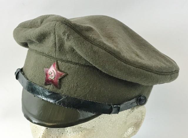 WW2 Russian Red Army EM / NCO Visor Cap: Early World War Two Russian Red Army EM / NCO Visor Cap. Olive drab wool construction with leatherette visor, enameled Red Army Star insignia lacquered chin strap. Interior cloth lined with leatherett