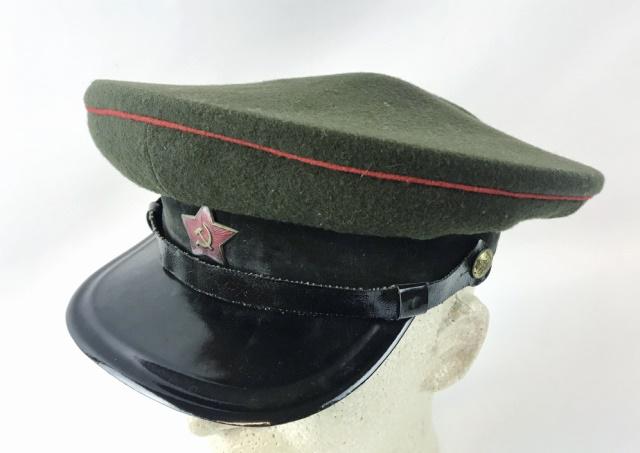 WW2 Russian Red Army Artillery Officer Visor Cap: World War Two Russian Red Army Visor Cap. Olive drab wool construction with red piping, lacquered chinstrap and visor, enameled Red Army Star insignia. Interior cloth lined with leatherette sweatband,
