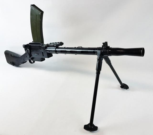 WW2 Portuguese Army Madsen Light Machine Gun INERT: World War Two Portuguese Army Madsen Light Machine Gun. Torch cut inoperable receiver with original parts. Accompanied by magazine. Excellent condition, black painted surfaces. ATTENTION: THIS IS LEGA