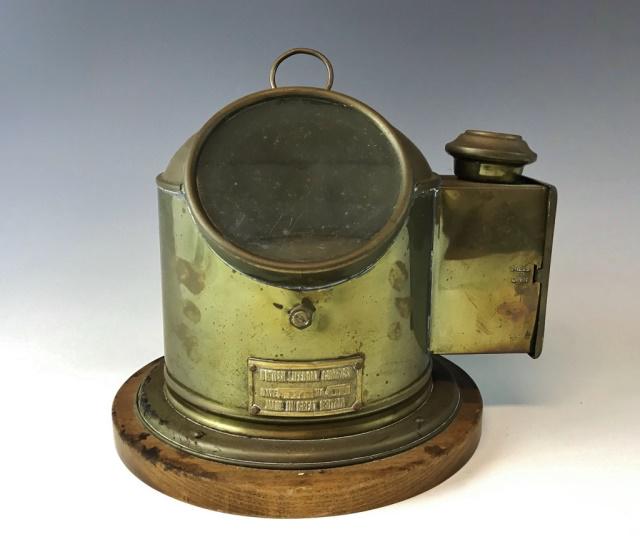 1934 Dated British Life Boat Binnacle Compass: 1934 Dated British Lifeboat Binnacle. Liquid filled gimbaled compass housed in brass binnacle mounted to wooden base. Brass plate reads, " BRITISH LIFEBOAT COMPASS DATE 1934 NO. 613 MADE IN GREAT BRIT