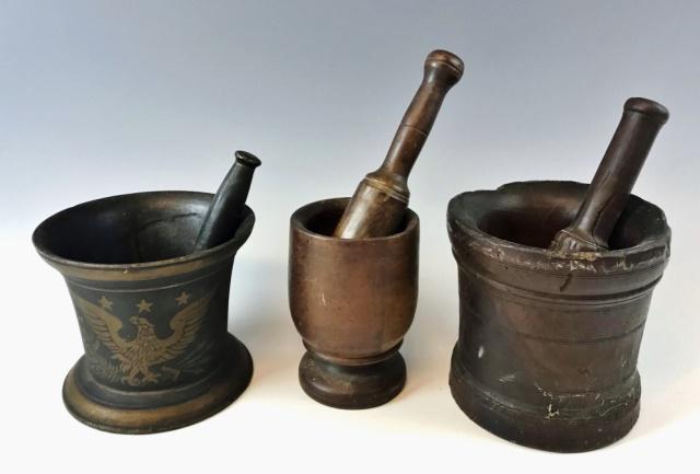 Antique Treen and Iron Mortar & Pestles (6pc): Collection of three 19th C. Mortar and Pestles: (2) Turned wooden treenware mortars with hardwood pestles, (1) Cast iron apothecary mortar and pestle, paint decorated with patriotic eagle and stars. L