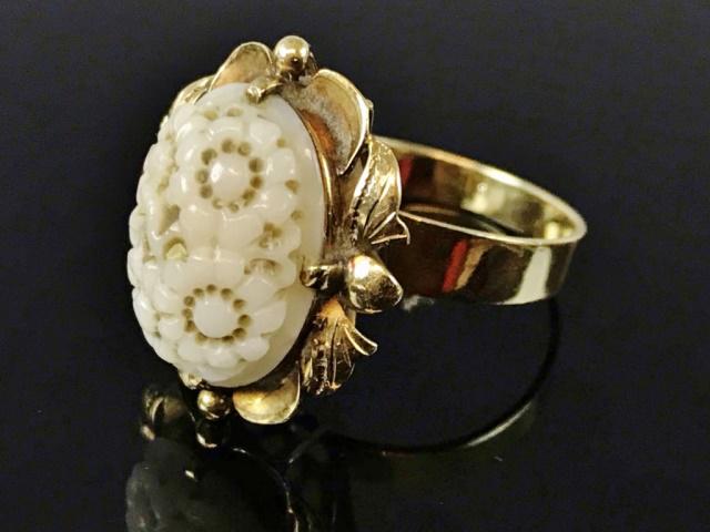14K Gold Ladies Ring Set with Natural Carved Jade: 14K Gold ladies jade ring. 14K yellow gold with a prong set quality carved natural white jade stone. Ring size: 7, Total weight: 5.2 g, 3.3 dwts.
