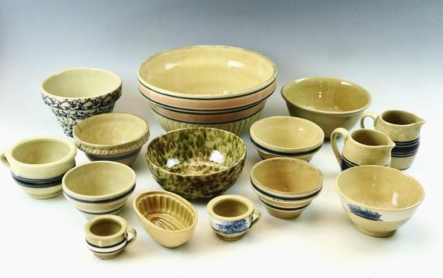 Antique Yellow Ware, Decorated Bowls, (15pc): Fifteen Piece Collection of Antique Ceramic Yellow Ware Vessels. Collection consists of mixing bowls, cups, molds and pitchers with multi color bands and seaweed decoration. Largest measures: 5.75" H,