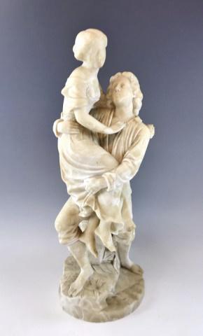 Antique Italian Alabaster Statue: Late 19th - Early 20th C. Italian Carved Alabaster Statue. Detailed depiction of a man holding a woman aloft. Excellent condition, measures: 20.5" H.