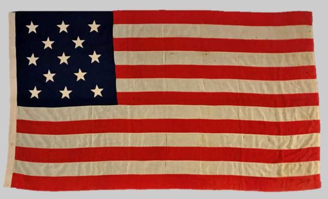 Civil War 13 Star American Navy Flag: 19th C. Civil War Period Hand Sewn Thirteen Star American Navy Flag. Hand sewn multi piece wool construction with hand cut appliqued stars in 3-2-3-2-3 configuration. Hollow canvas hoist (treadle sewn